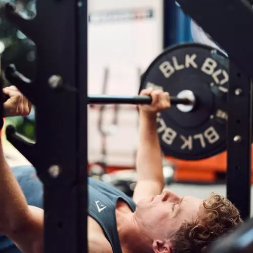 Man weight lifting in the gym